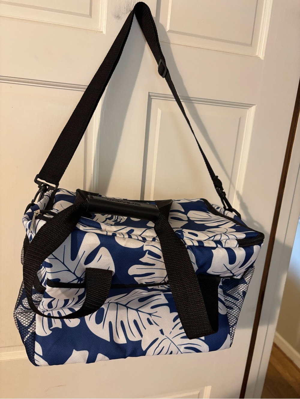 Navy Blue Tropical Leaf Insulated Cooler Bag,, Velcro handle and shoulder strap.